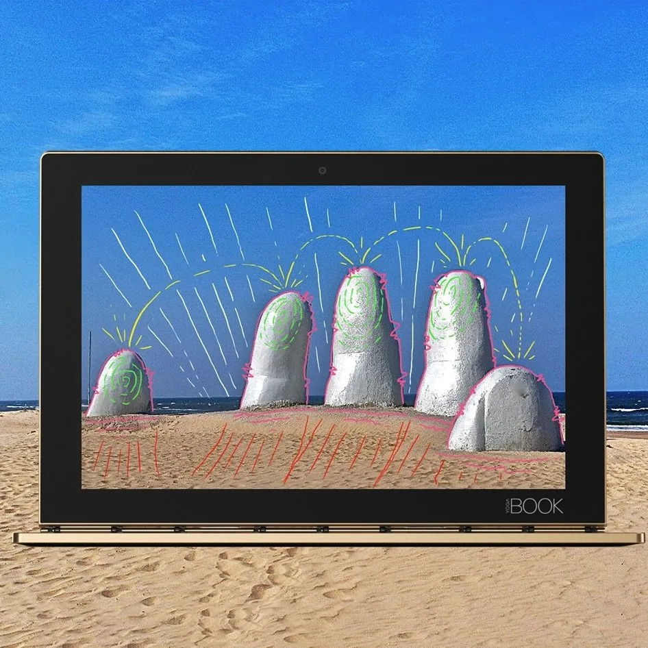 Lenovo Yoga Book piece with a drawing of La Mano in Punta del Este
