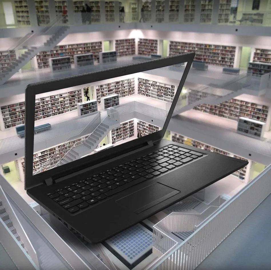 Lenovo piece: an open laptop over a multi-story library
