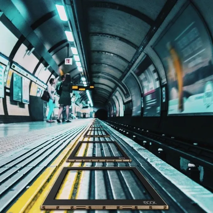 Lenovo Yoga Book piece: several units on a subway platform